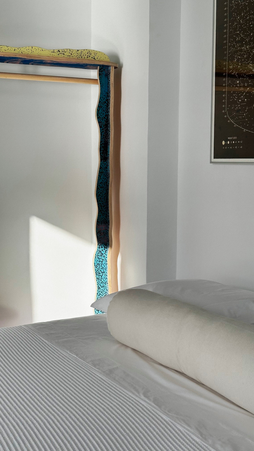 Bed and carved furniture detail at Corner House