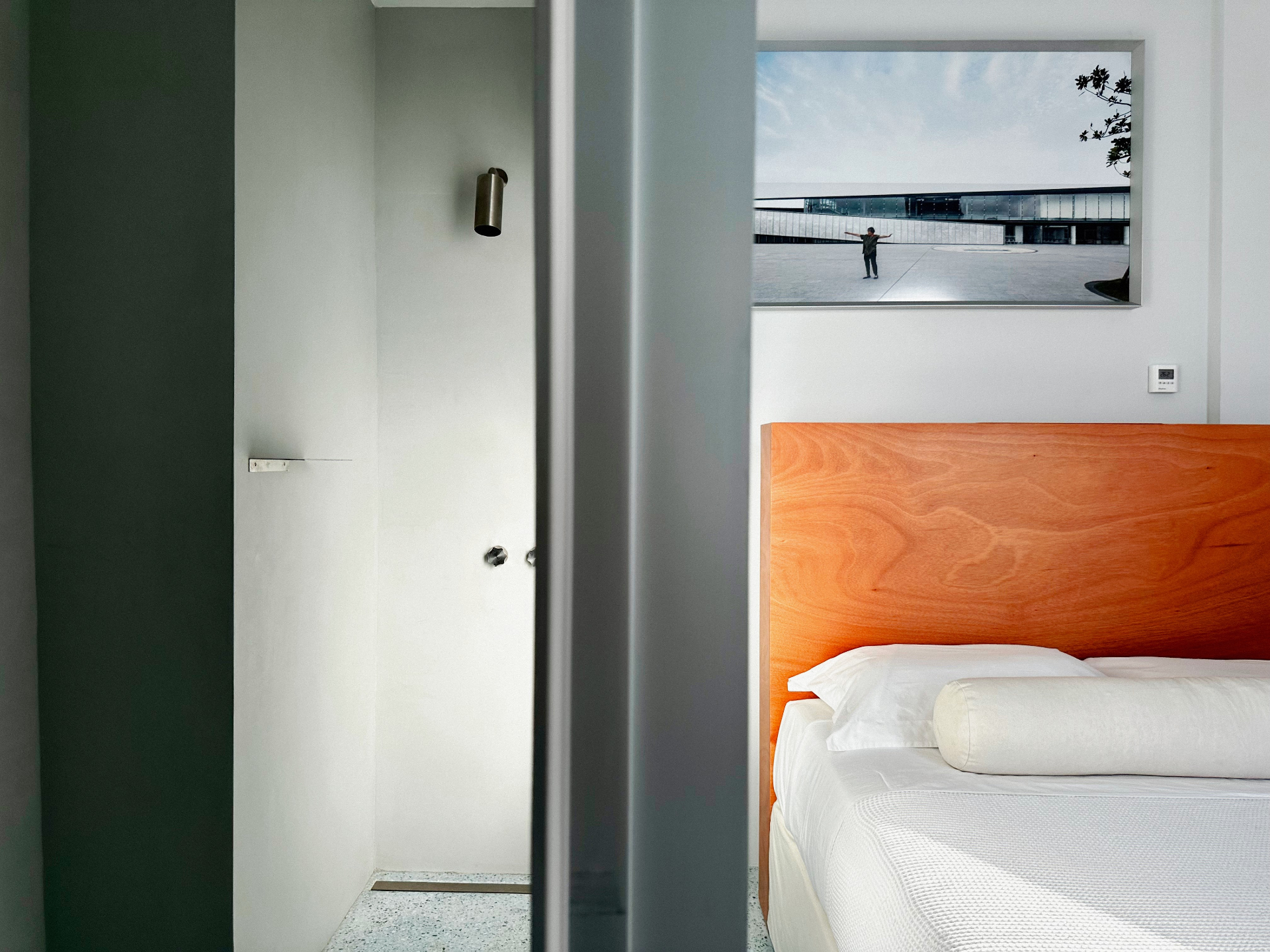 Bedroom view with timber headboard at Corner House